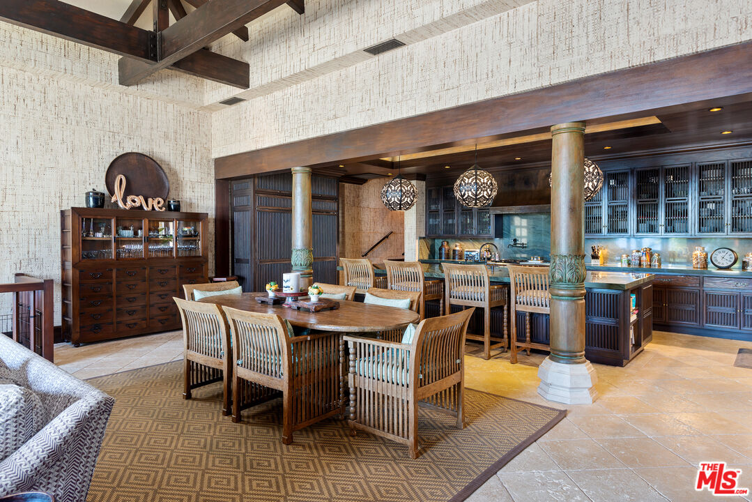 24834 Pacific Coast Highway Malibu, CA 90265 - Photo 16 of 38 a view of a dining room with furniture