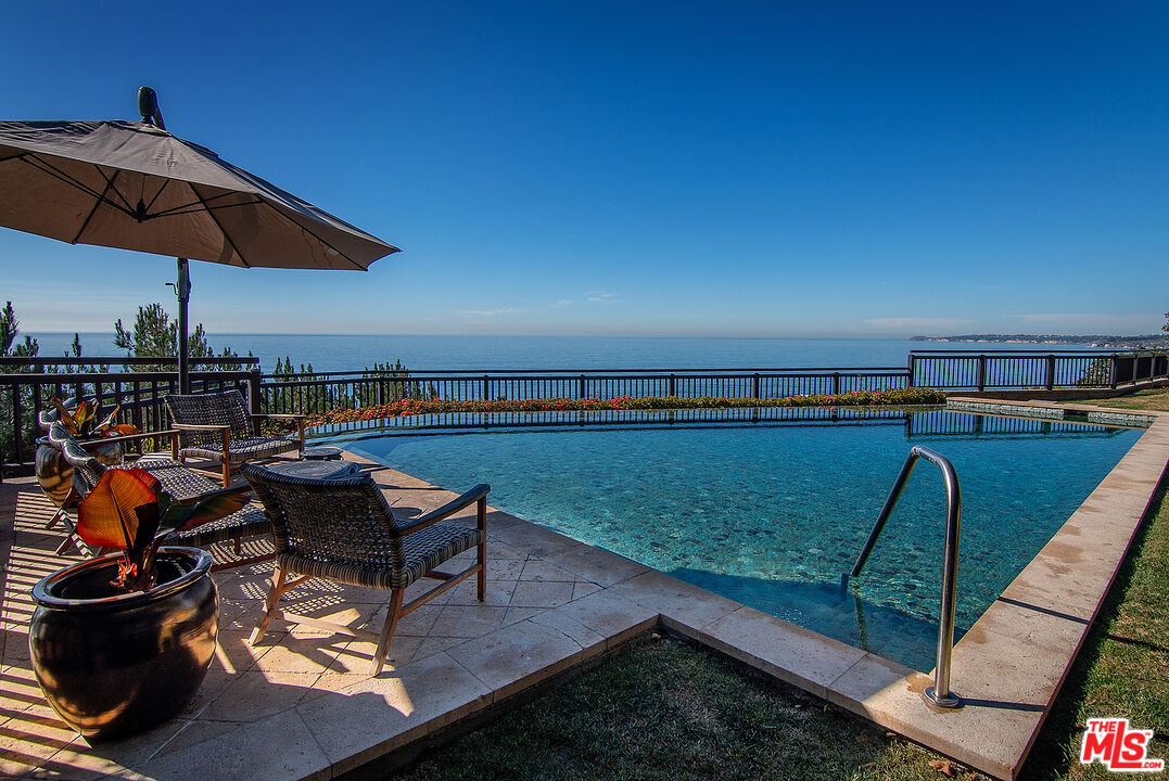 24834 Pacific Coast Highway Malibu, CA 90265 - Photo 28 of 38 swimming pool view with a seating space