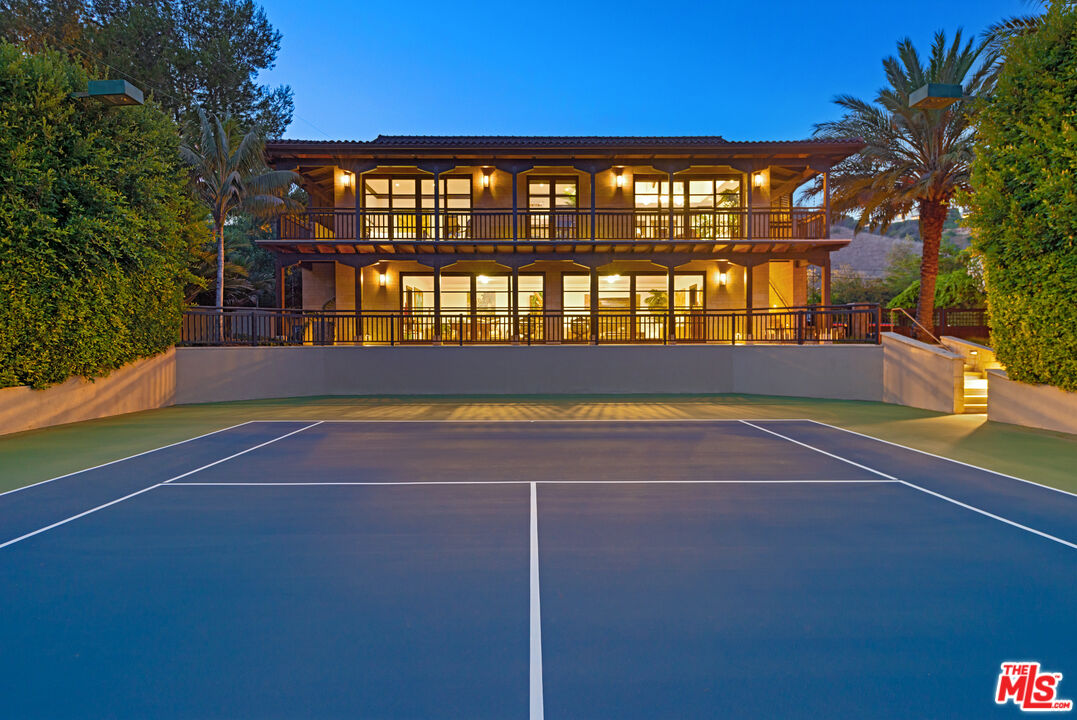 24834 Pacific Coast Highway Malibu, CA 90265 - Photo 29 of 38 a view of a swimming pool with an outdoor seating