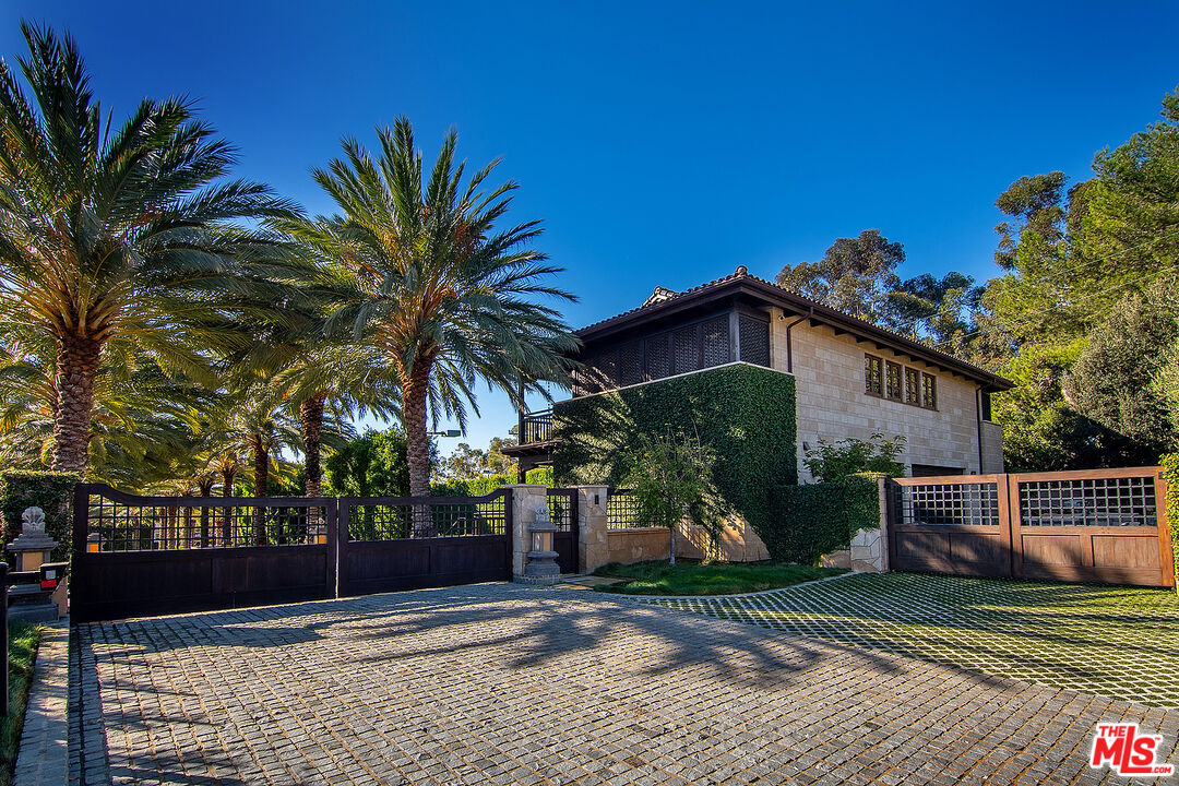24834 Pacific Coast Highway Malibu, CA 90265 - Photo 35 of 38 a view of a house with a yard