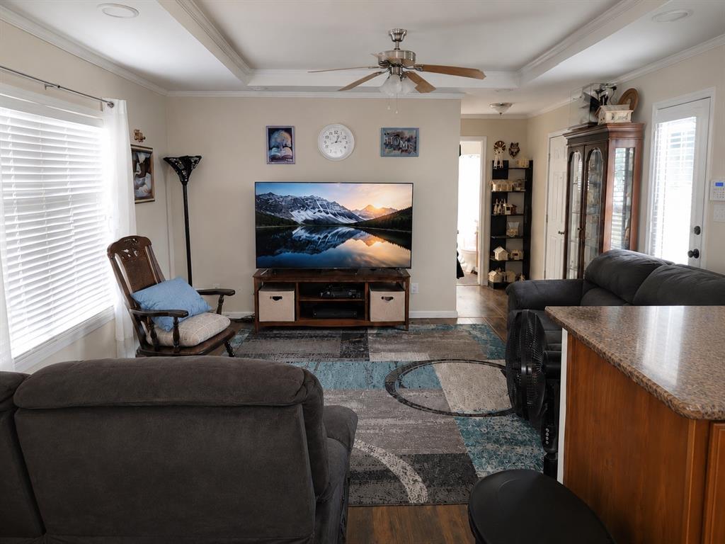 2900 Interstate 35, Unit 80 Waco, TX 76706 - Photo 4 of 10 a living room with furniture and a flat screen tv