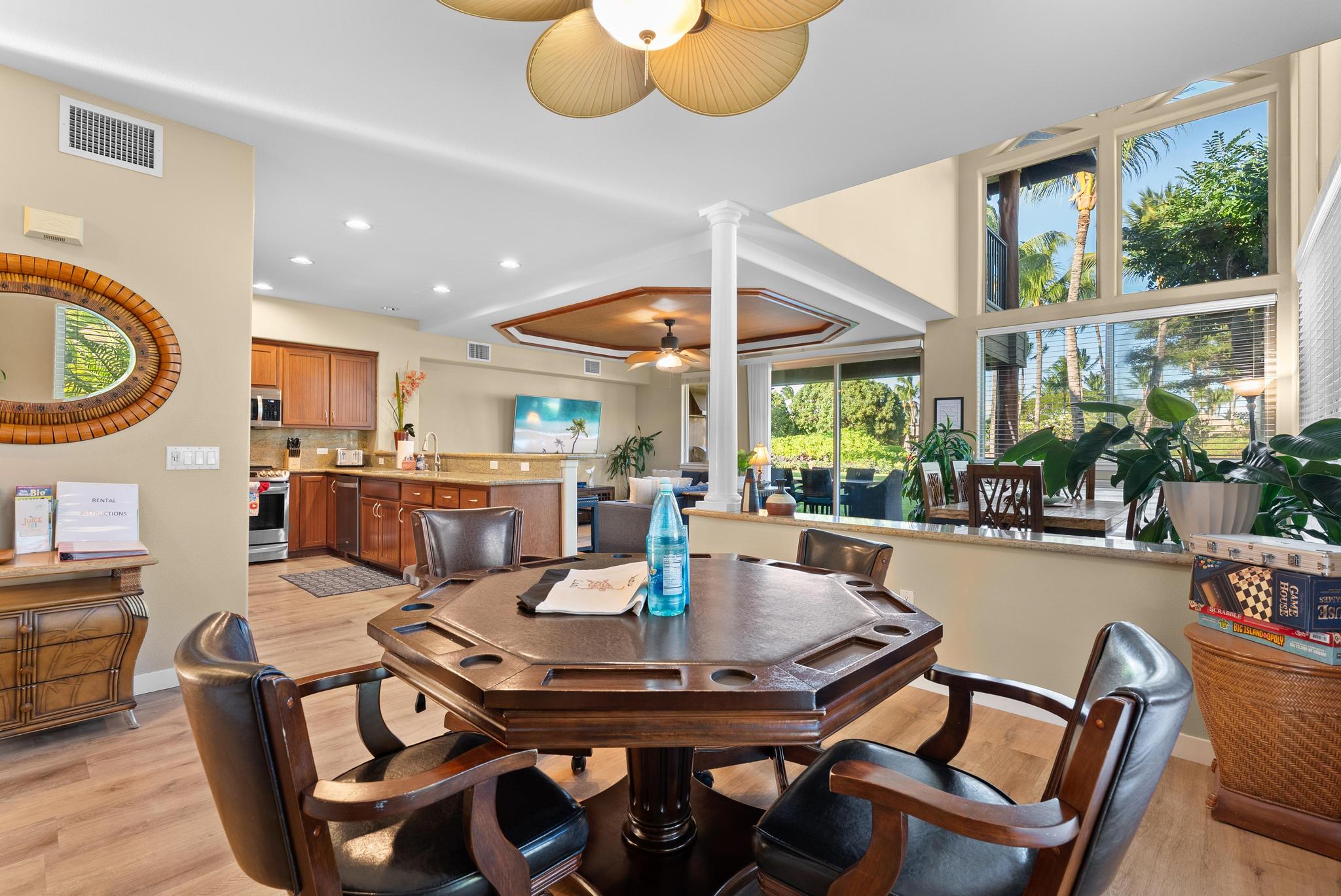 68-1122 Na Ala Hele Road, Unit Q4 Kamuela, HI 96743 - Photo 8 of 30 a dining room with furniture and a large window