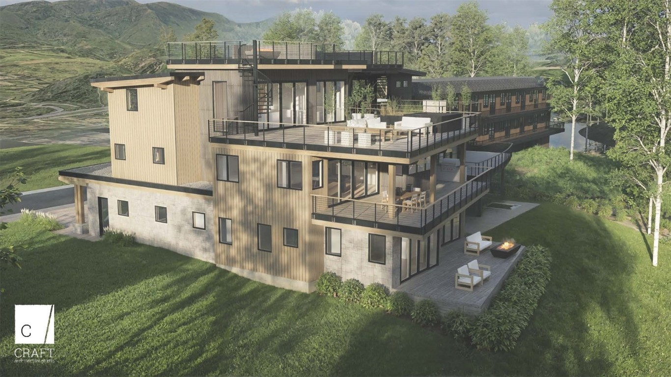 aerial view of a house with a yard