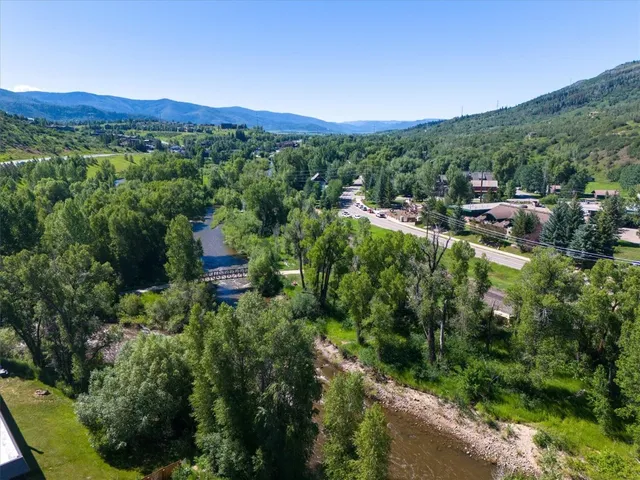a view of a city with a lake view