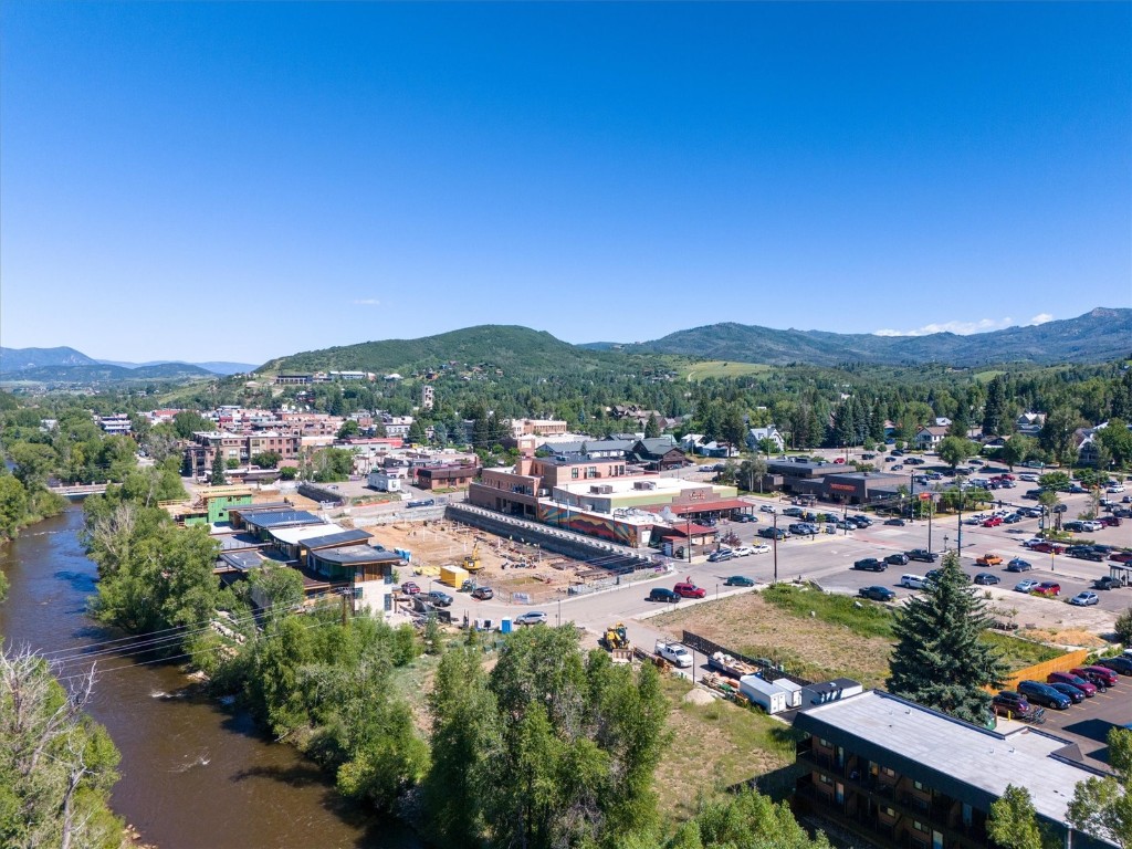 303 Riverview Way Steamboat Springs, CO 80487 - Photo 15 of 44 a view of a city with a lake view