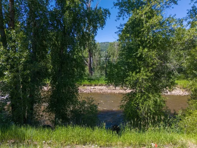 a view of a city with a lake