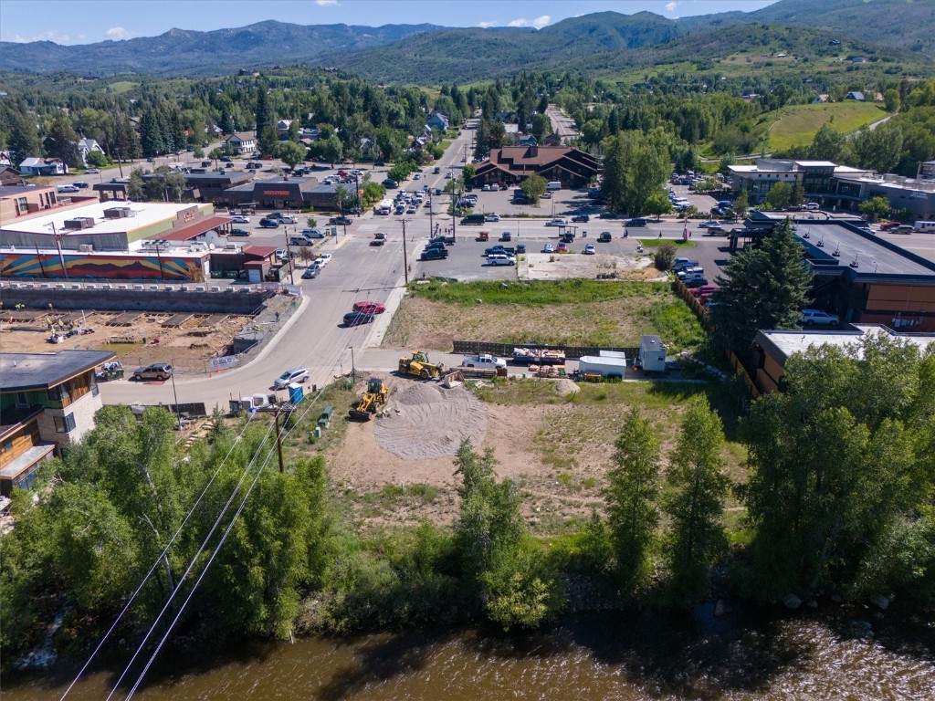 303 Riverview Way Steamboat Springs, CO 80487 - Photo 20 of 44 a view of a city with a lake
