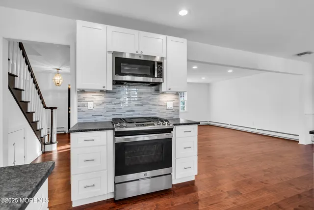 a view of livingroom with hardwood floor and window