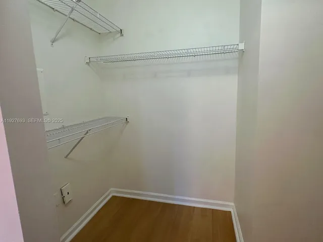 a view of a room with racks on the wall