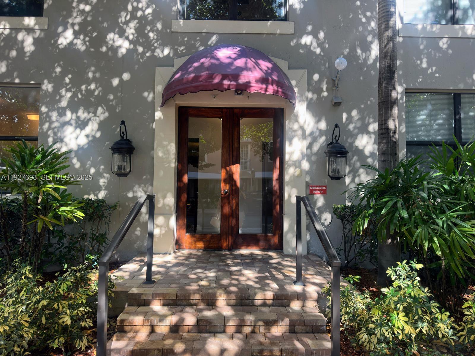 1919 Van Buren Street, Unit 118A Hollywood, FL 33020 - Photo 2 of 36 a front view of a house