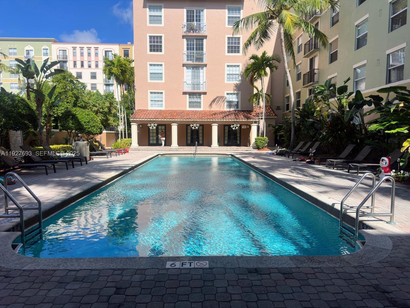 1919 Van Buren Street, Unit 118A Hollywood, FL 33020 - Photo 29 of 36 a view of a house with backyard