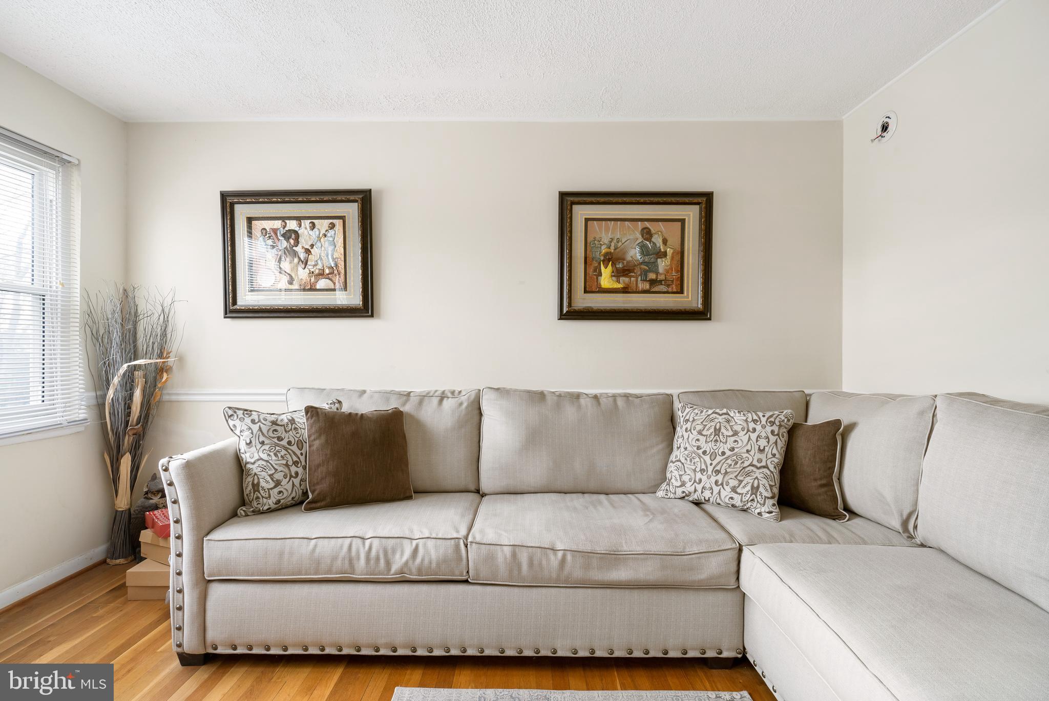 640 Charraway Road Baltimore, MD 21229 - Photo 5 of 21 Living Room with Hardwood Floors