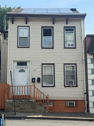 a front view of a house with windows