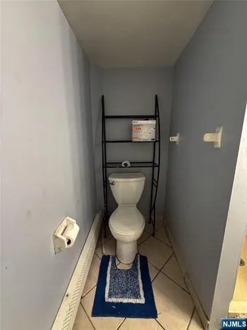 a bathroom with a toilet and a sink