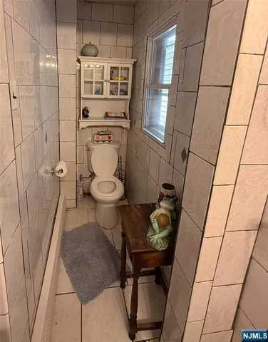 a bathroom with a sink and toilet