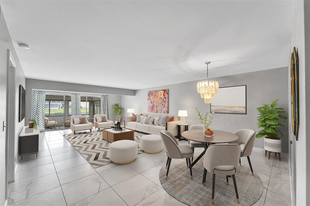 1521 Northwest 19th Terrace, Unit 101 Delray Beach, FL 33445 - Photo 18 of 42 a living room with furniture and a table