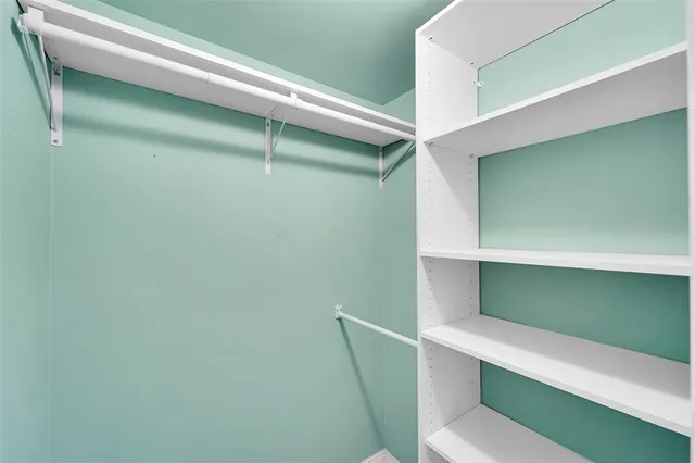 a hallway with chairs