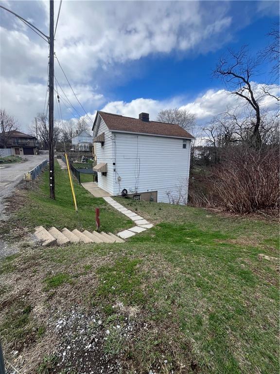 1360 Center Street McKees Rocks, PA 15136 - Photo 2 of 18 a view of a backyard