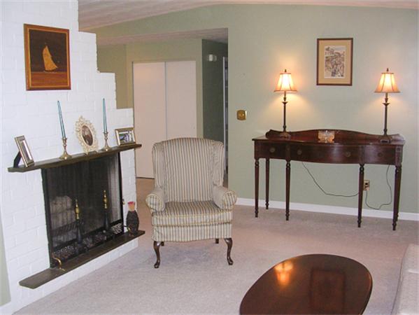 6 Donna Road Chelmsford, MA 01824 - Photo 6 of 9 a living room with furniture and a fireplace
