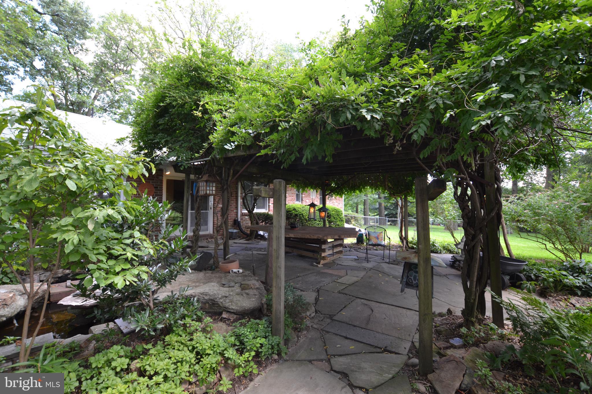 24403 Hipsley Mill Road Gaithersburg, MD 20882 - Photo 15 of 43 Rear Covered Patio