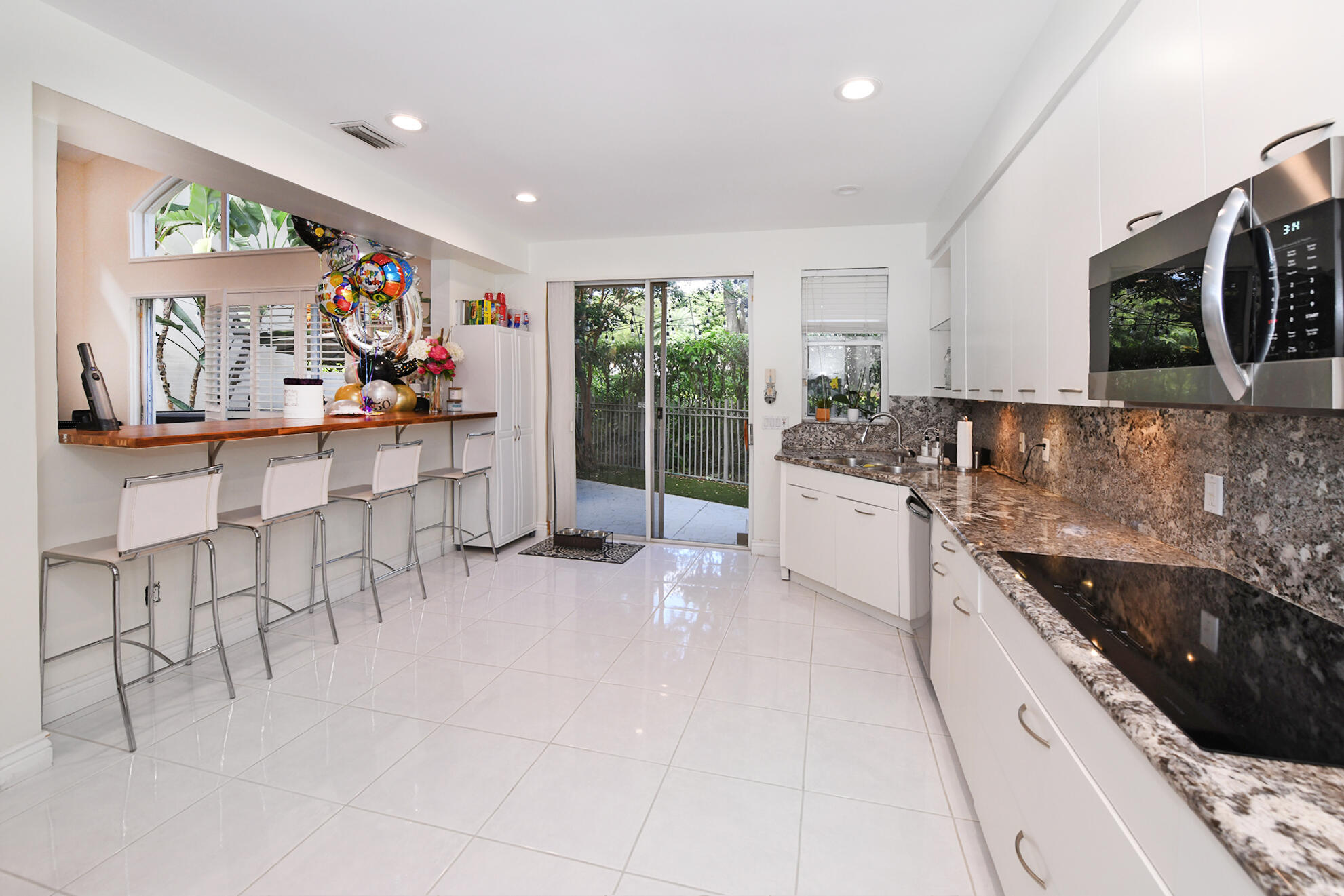 2621 Northwest 53rd Drive Boca Raton, FL 33496 - Photo 11 of 43 Breakfast Bar and View