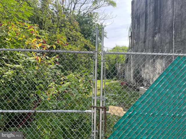 a view of a yard from a balcony