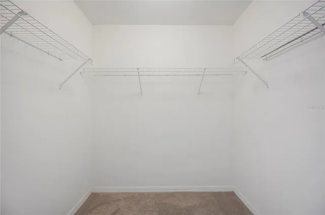 a view of a room with racks on the wall