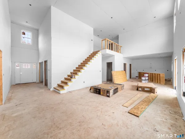 a view of entryway with wooden floor