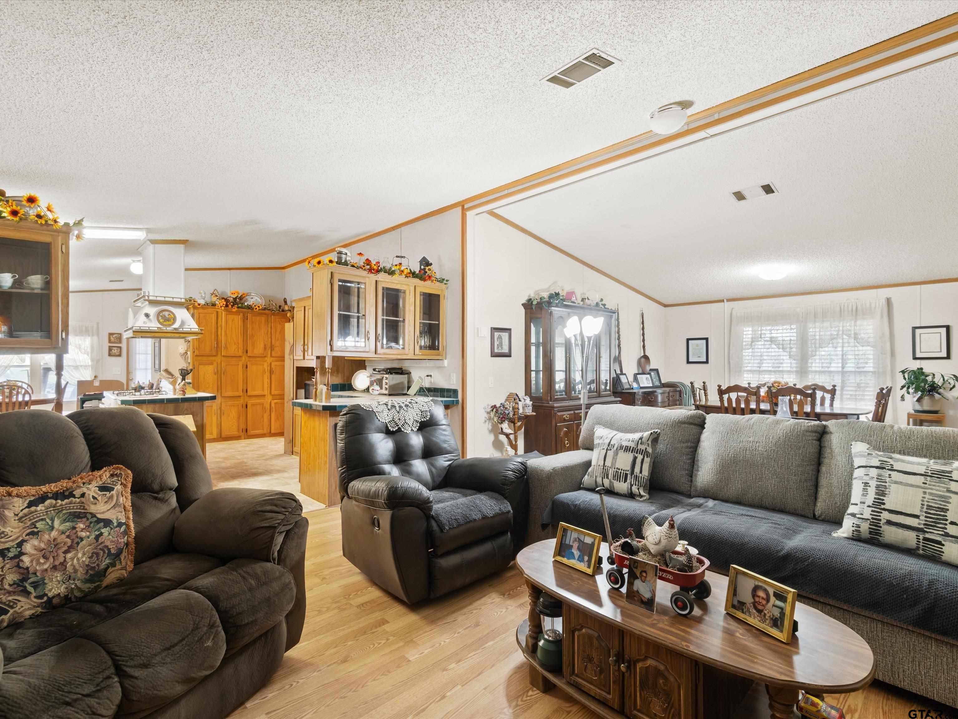 2811 Medlin Road Gilmer, TX 75645 - Photo 19 of 30 a living room with furniture and a large window