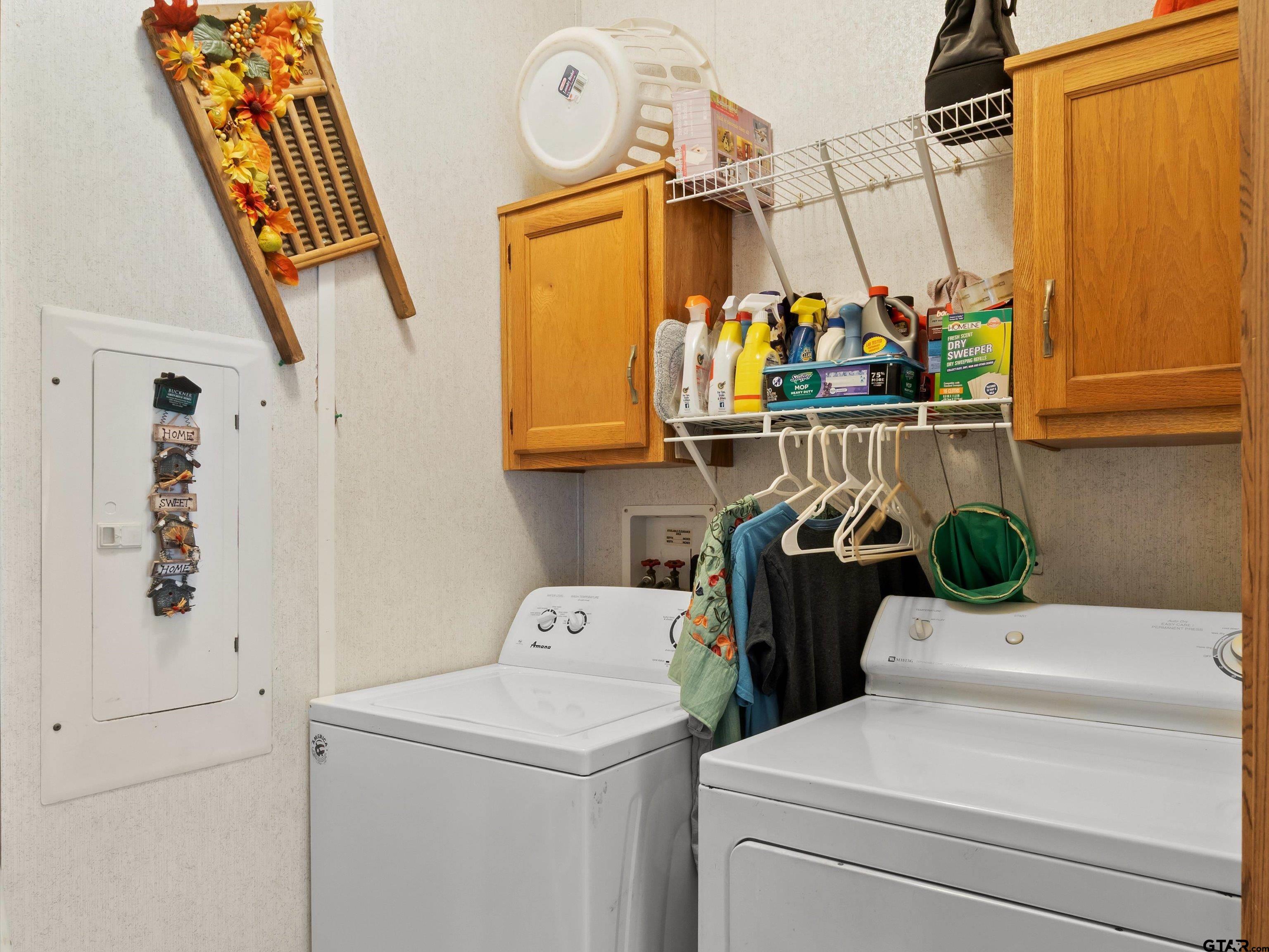 2811 Medlin Road Gilmer, TX 75645 - Photo 26 of 30 a utility room with dryer and washer