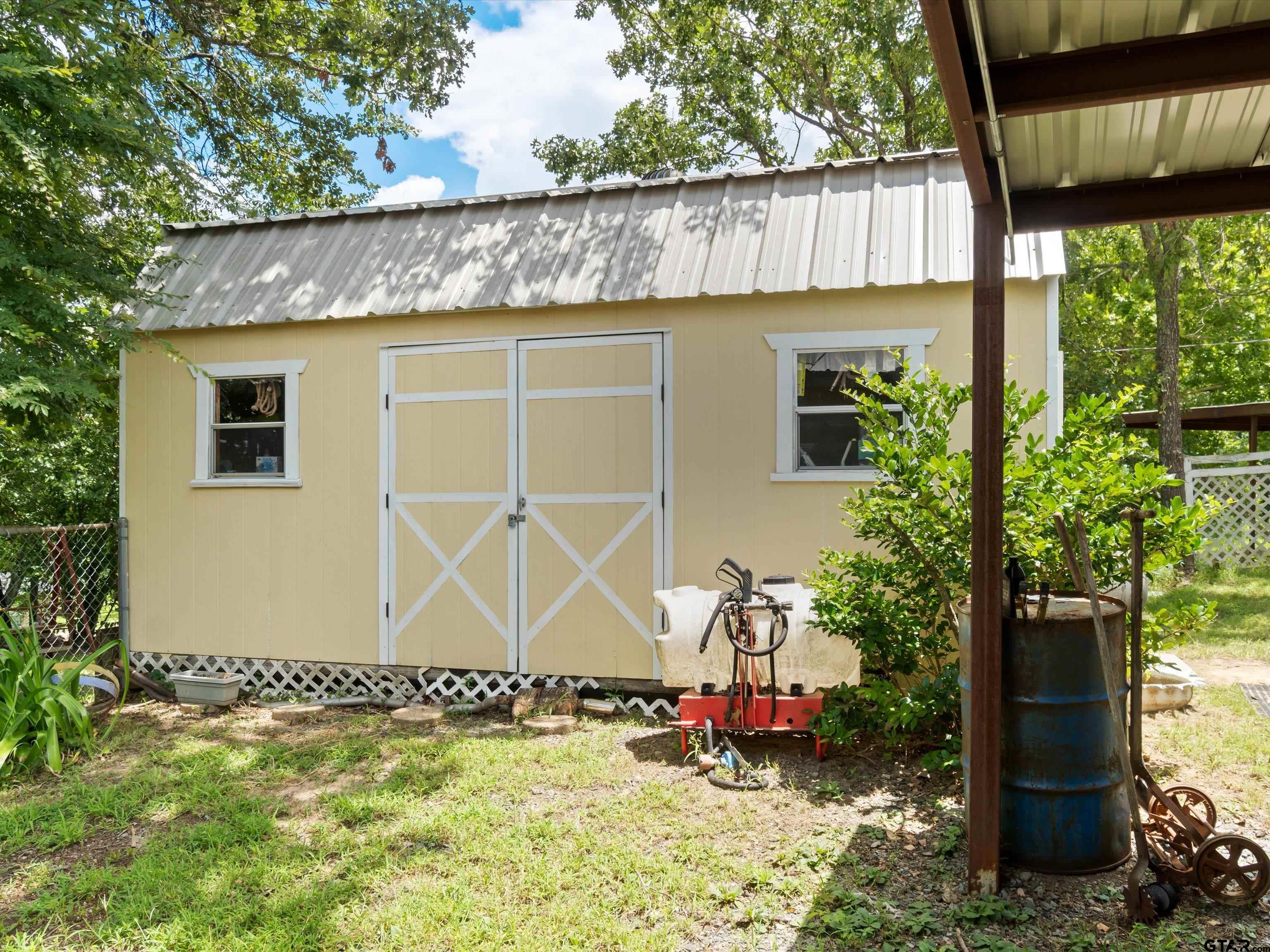 2811 Medlin Road Gilmer, TX 75645 - Photo 27 of 30 a view of front door of house