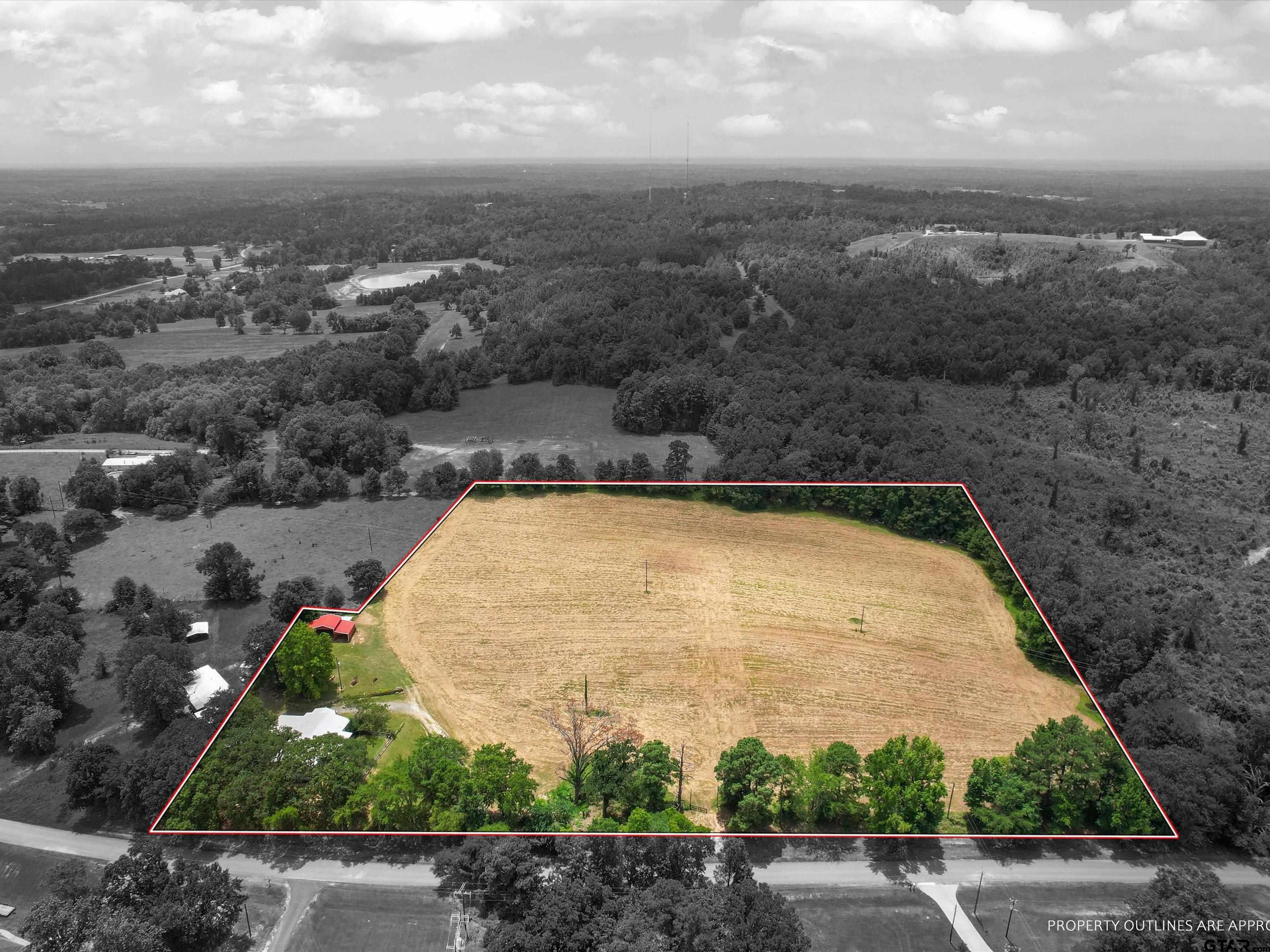 2811 Medlin Road Gilmer, TX 75645 - Photo 3 of 30 an aerial view of a house