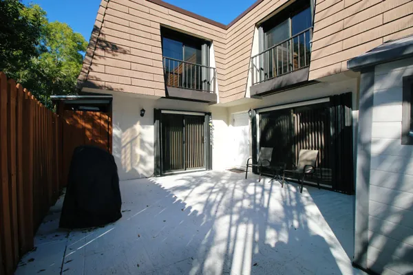 a view of a house with a door and a window