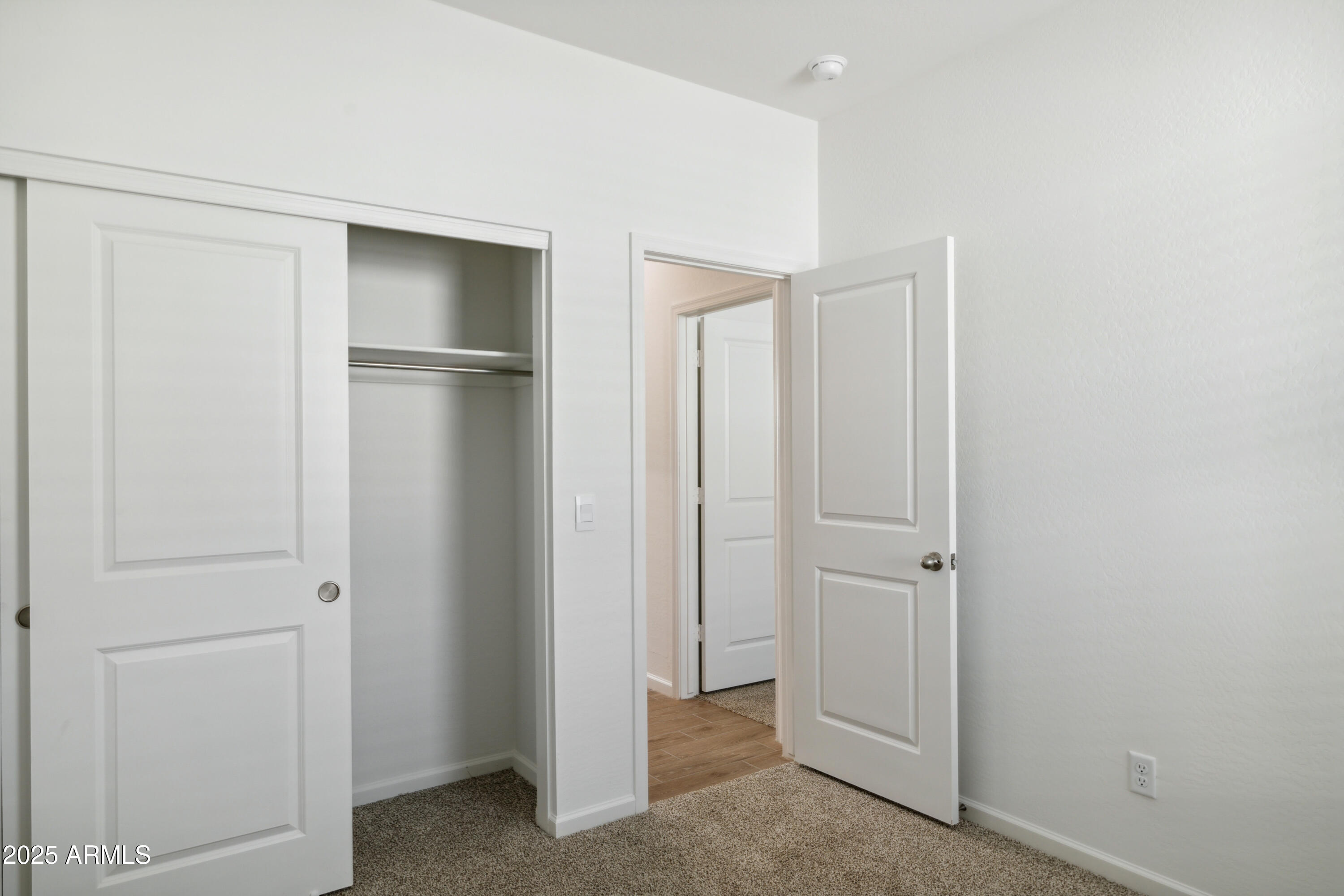 25470 West Fraktur Road Buckeye, AZ 85326 - Photo 9 of 12 a view of an empty room