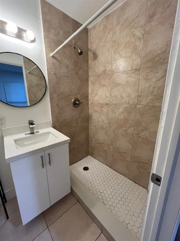 2300 Northwest 6th Street, Unit 9 Fort Lauderdale, FL 33311 - Photo 5 of 6 a bathroom with a sink vanity granite toilet and shower