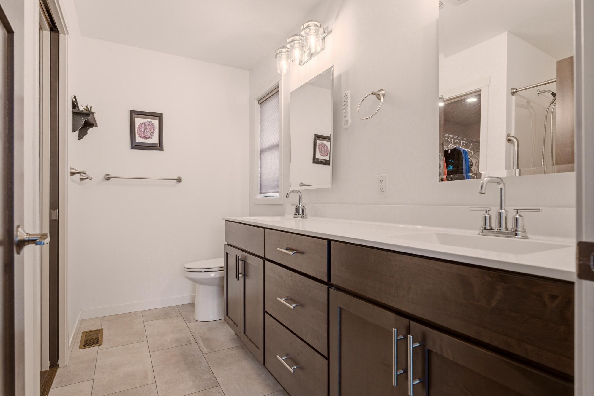 1709 Killdeer Street Holmen, WI 54636 - Photo 14 of 26 Primary bathroom w/ walk in shower & closet