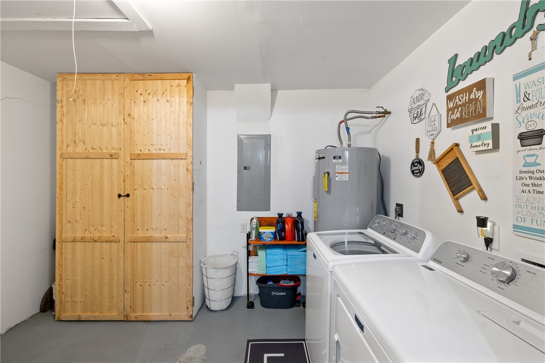 302 Dan Drive Somerville, TX 77879 - Photo 11 of 20 a room with a refrigerator and washer