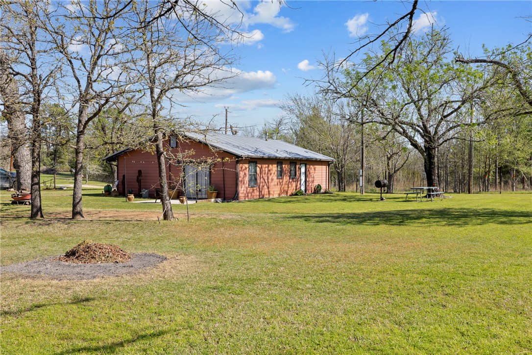 302 Dan Drive Somerville, TX 77879 - Photo 15 of 20 a view of a house with a yard