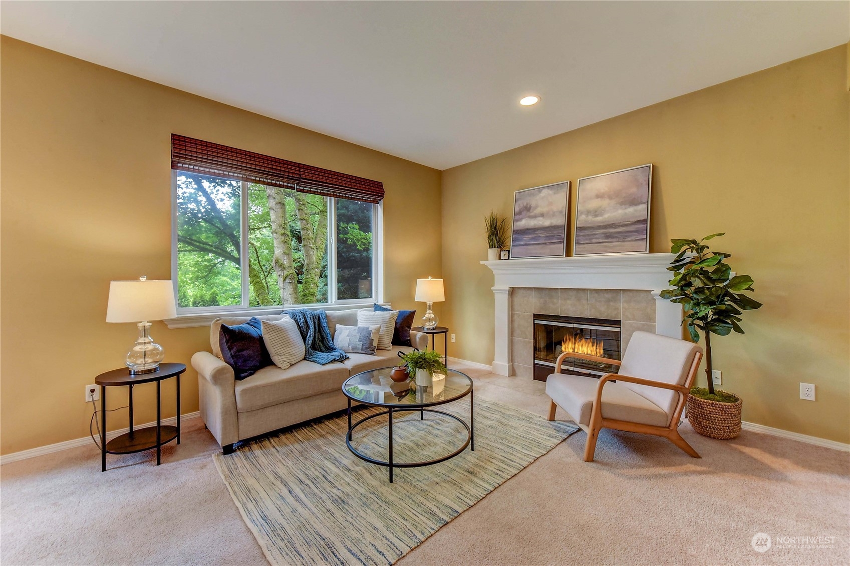 18290 Tahoma Street Southeast Monroe, WA 98272 - Photo 15 of 32 a living room with furniture and a fireplace