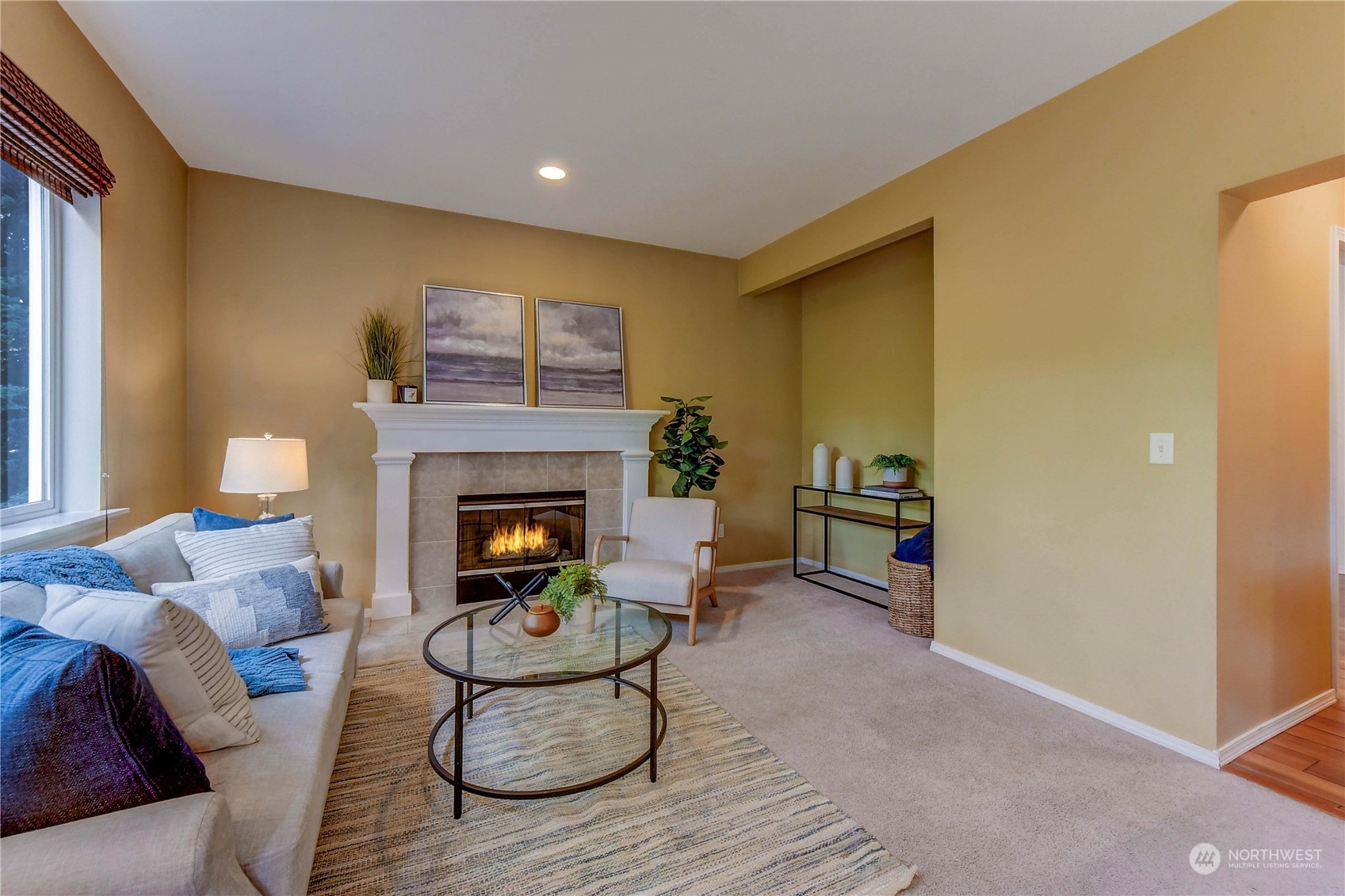 18290 Tahoma Street Southeast Monroe, WA 98272 - Photo 16 of 32 a living room with furniture and a fireplace