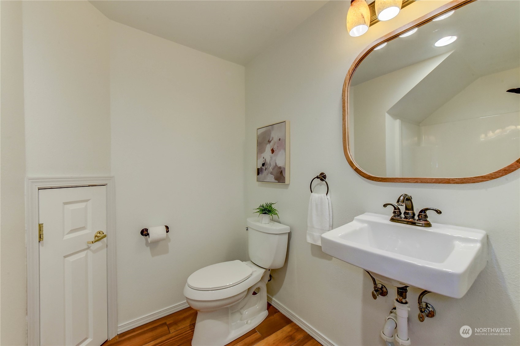18290 Tahoma Street Southeast Monroe, WA 98272 - Photo 19 of 32 a bathroom with a sink mirror and toilet
