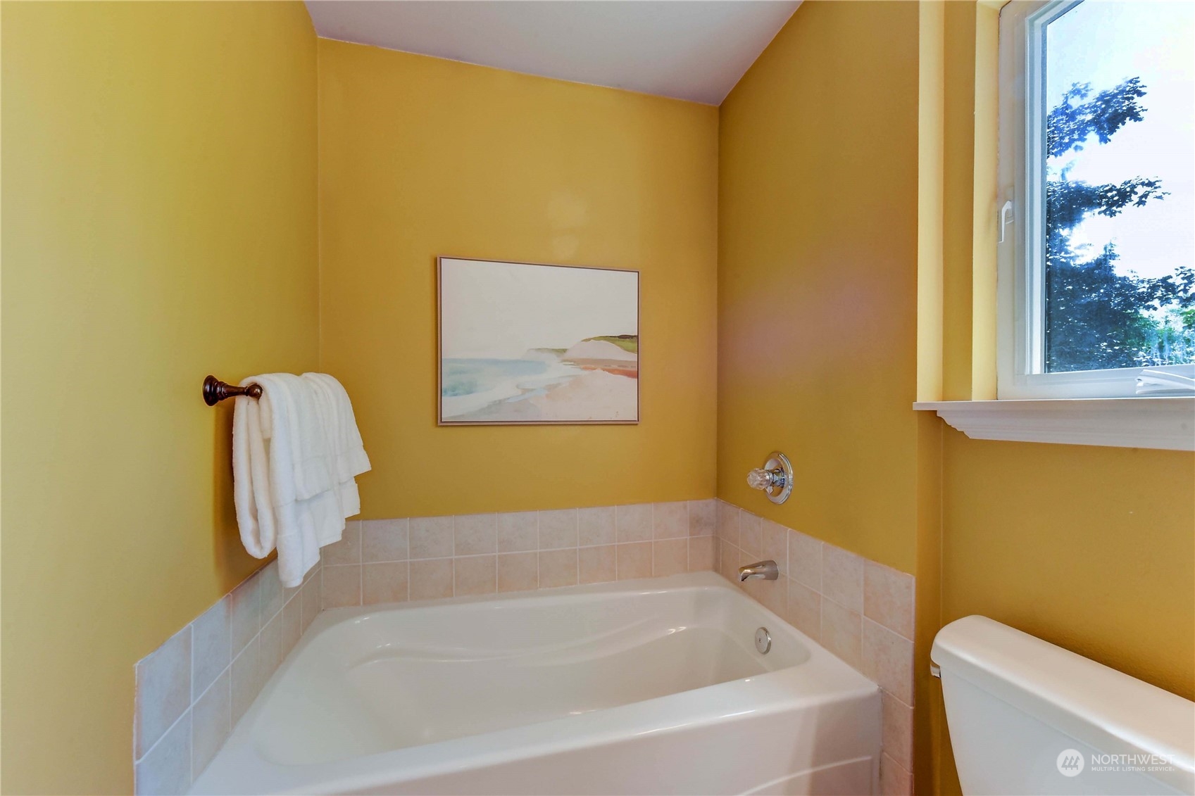 18290 Tahoma Street Southeast Monroe, WA 98272 - Photo 23 of 32 a bathroom with a tub and a chair