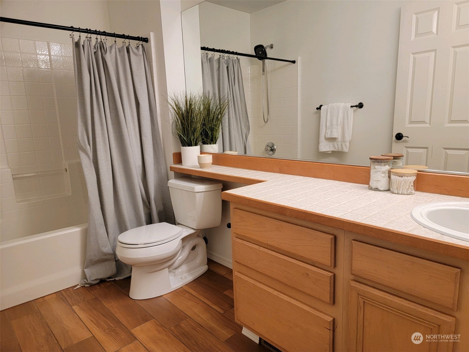 18290 Tahoma Street Southeast Monroe, WA 98272 - Photo 24 of 32 a bathroom with a sink a toilet and a mirror