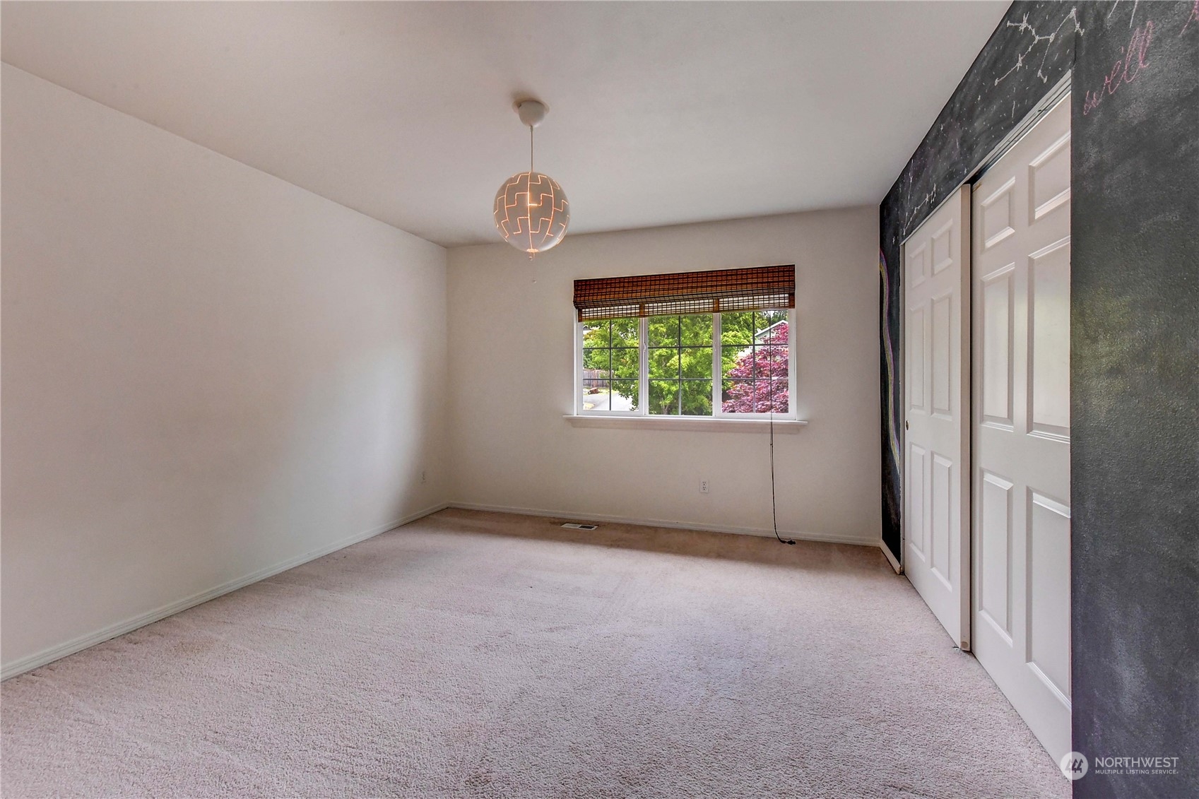18290 Tahoma Street Southeast Monroe, WA 98272 - Photo 25 of 32 an empty room with windows and fan