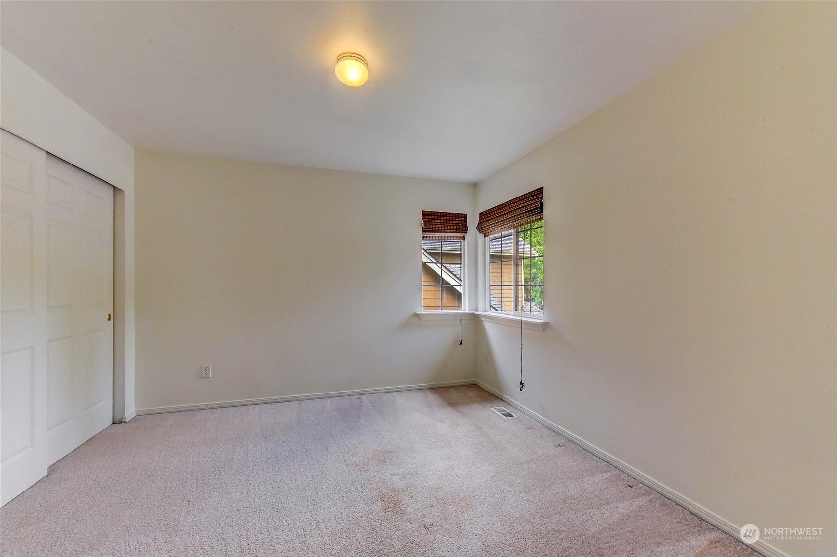 18290 Tahoma Street Southeast Monroe, WA 98272 - Photo 26 of 32 an empty room with windows