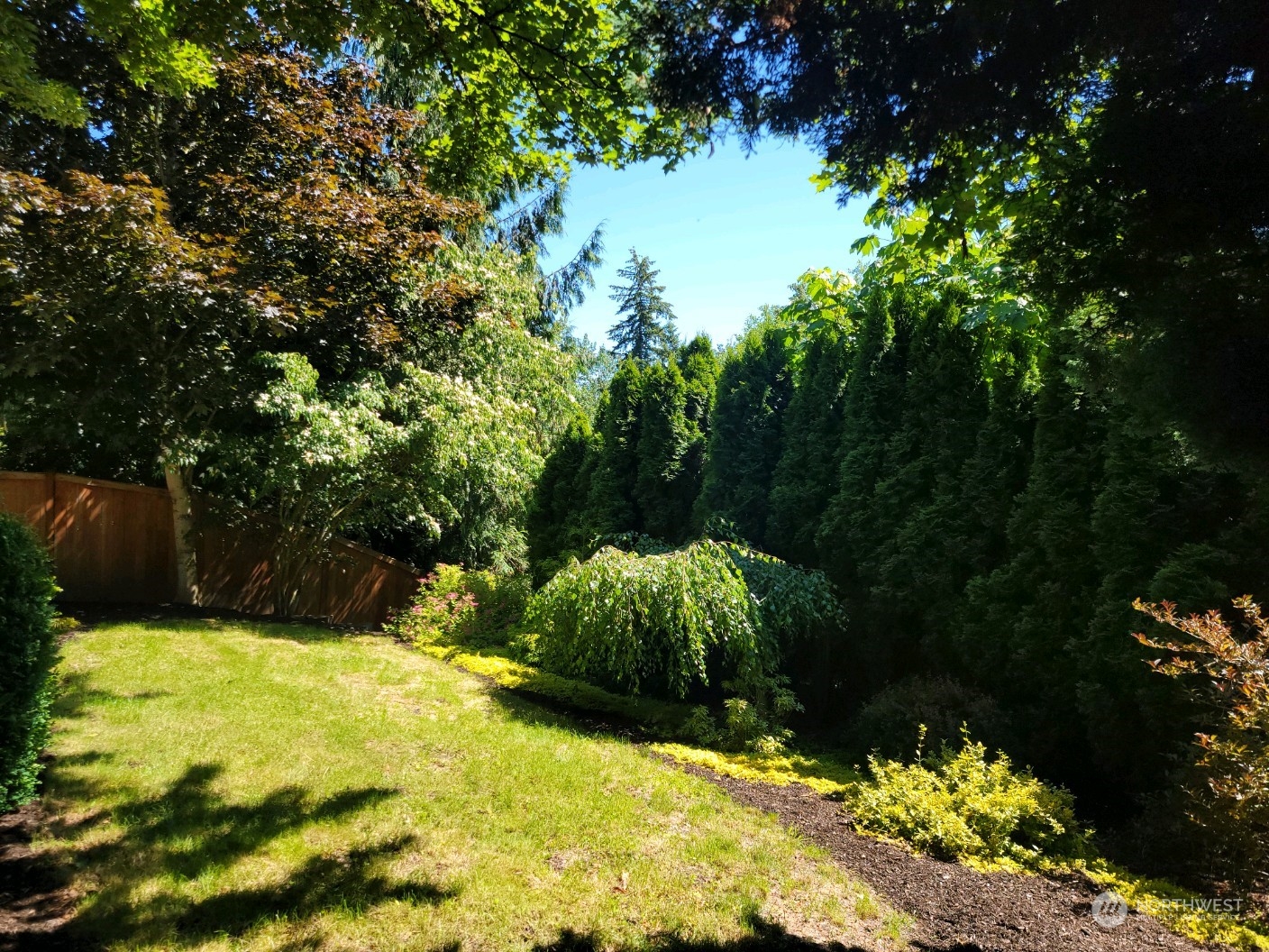 18290 Tahoma Street Southeast Monroe, WA 98272 - Photo 30 of 32 a view of a garden