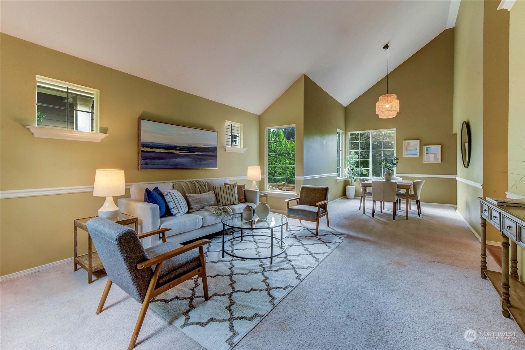 18290 Tahoma Street Southeast Monroe, WA 98272 - Photo 6 of 32 a living room with furniture and a floor to ceiling window