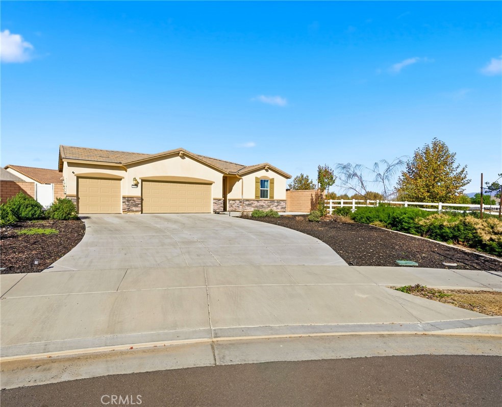3 Car Garage + Driveway Large Enough for 6 Vehicles