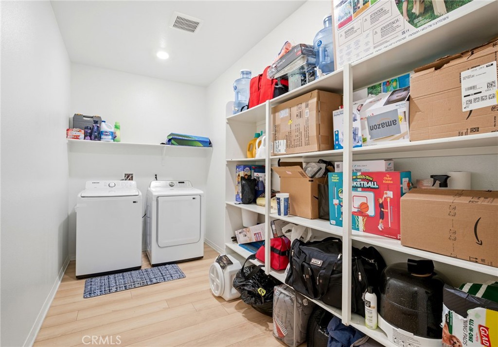 1903 Breachy Way Hemet, CA 92545 - Photo 18 of 28 Large Laundry Interior Laundry Room with Built-In Shelving