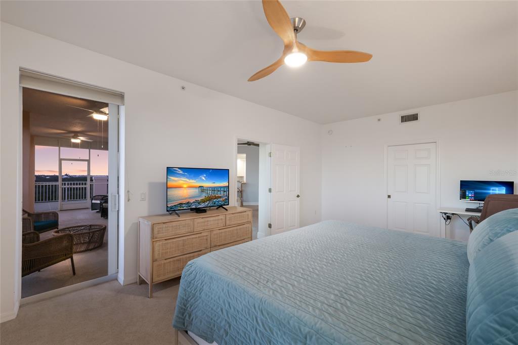13113 Gasparilla Road, Unit 503 Placida, FL 33946 - Photo 17 of 87 a bedroom with a bed and a television